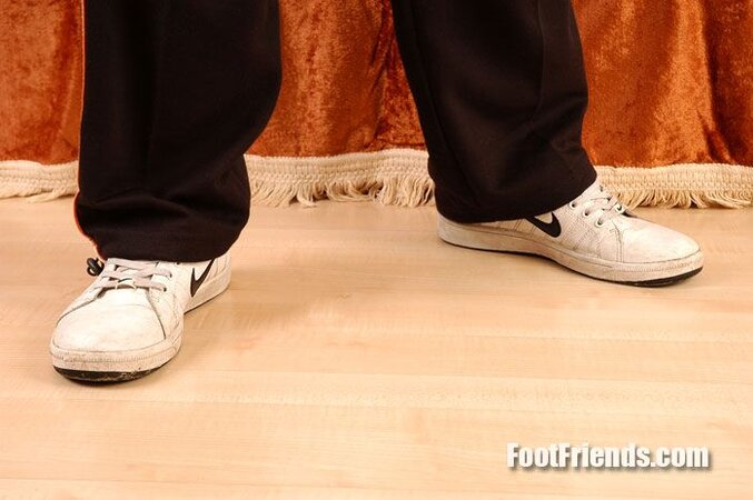 Rick shows off his socks and feet