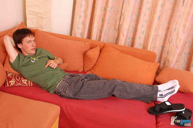Pavel shows off his socks and feet