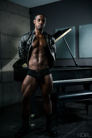 DeAngelo Jackson shows off his muscular body