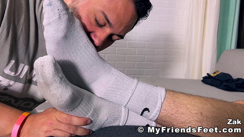 Zak is hesitant but enjoys Daniel sucking his toes