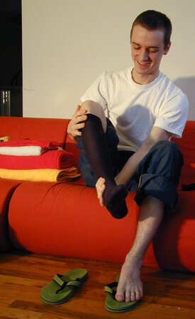 Aaron tries on various socks from the vault