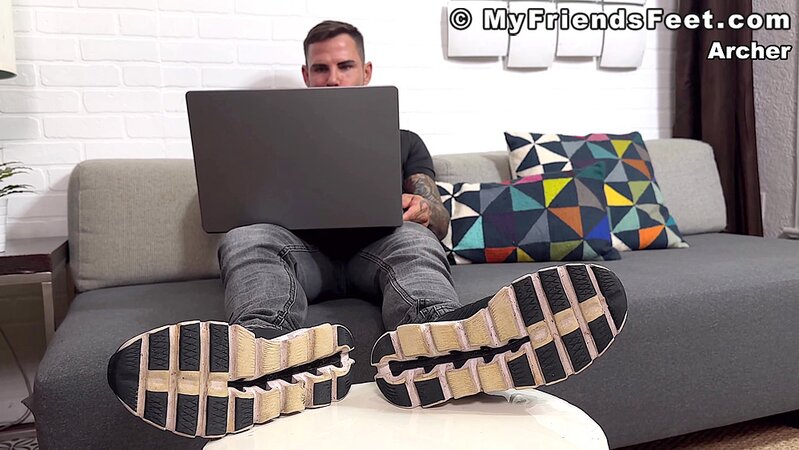 Archer Croft teases with his socked feet before stripping down