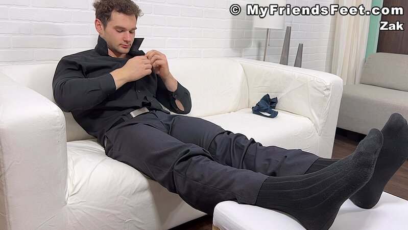 Zak takes off his socks to expose his stunning muscle physique
