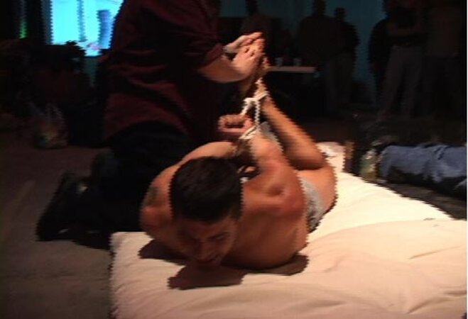 Volunteers submit to playful tickling at the World Tickling Federation's first event