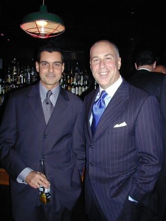 Men in suits gather for a thrilling foot fetish party
