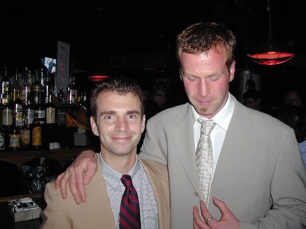 Men in suits gather for a thrilling foot fetish party