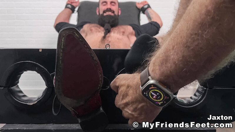 Jaxton's sheer socks are removed to expose his soft and smooth feet for tickling