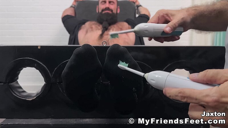 Jaxton's sheer socks are removed to expose his soft and smooth feet for tickling