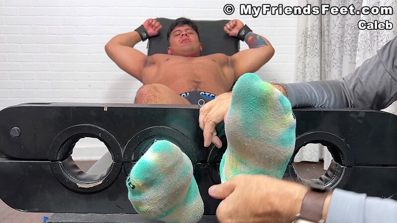 Caleb's feet are incredibly responsive to tickling