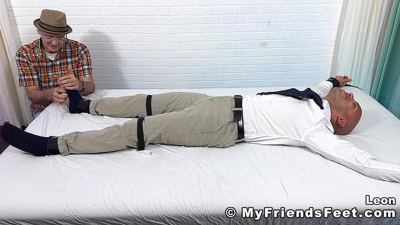 Leon Carrera enjoys a thorough tickling session