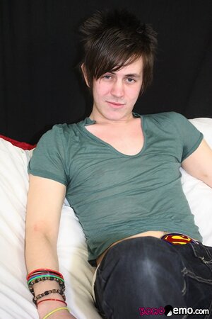 Zackarry Starr jerks off his massive 9-inch uncut cock alone