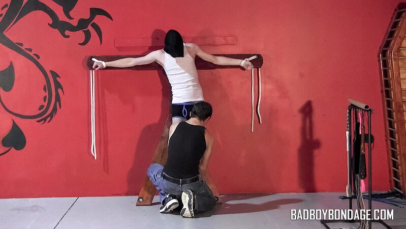 Aiyden Moore is whipped and paddled by Damien Rage
