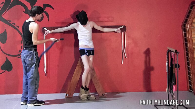 Aiyden Moore is whipped and paddled by Damien Rage
