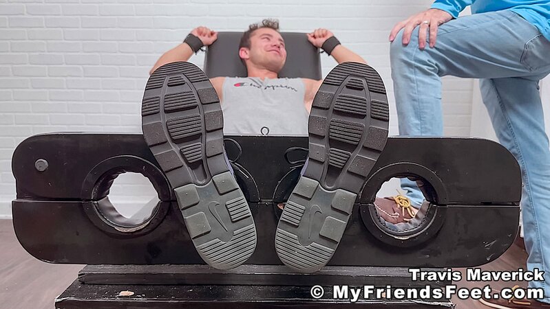 Dan Edwards tickles Travis Maverick’s feet and he laughs