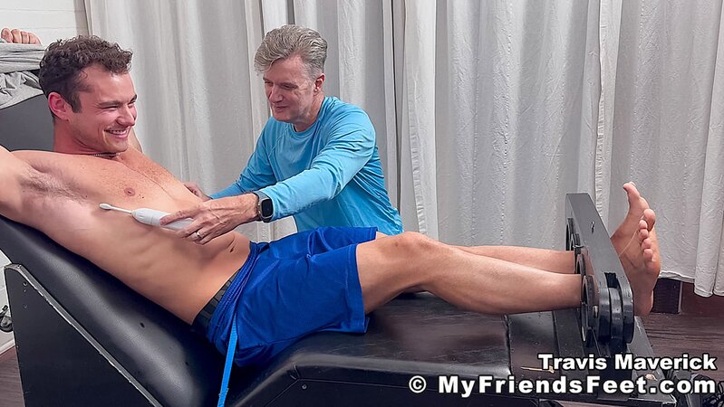 Dan Edwards tickles Travis Maverick’s feet and he laughs