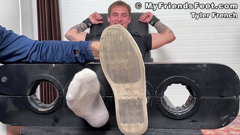 Tyler French giggles as Dan Edwards tickles his sides