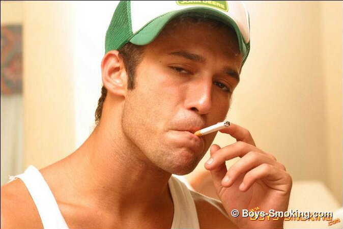 Cowboy Cody masturbates hard while smoking and shows his bubble butt