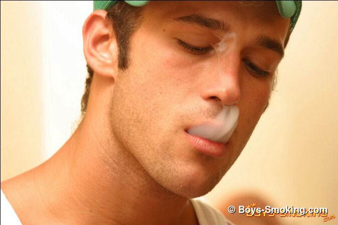 Cowboy Cody masturbates hard while smoking and shows his bubble butt