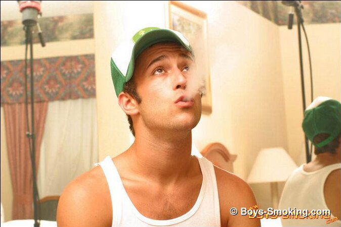 Cowboy Cody masturbates hard while smoking and shows his bubble butt