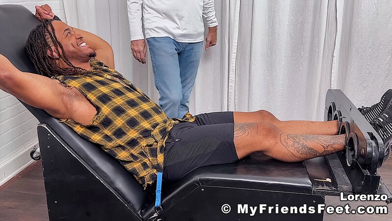 Lorenzo laughs hard as Dan Edwards tickles his ribs