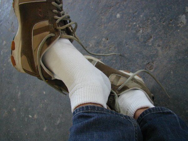 Sebastian shows his sweaty white socks after gym