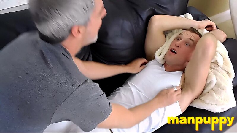 Alrik Angel squirms as Richard Lennox tickles his abs