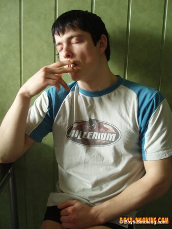 Gus Kitchen strokes his cock while smoking and cums fast