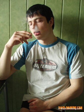 Gus Kitchen strokes his cock while smoking and cums fast