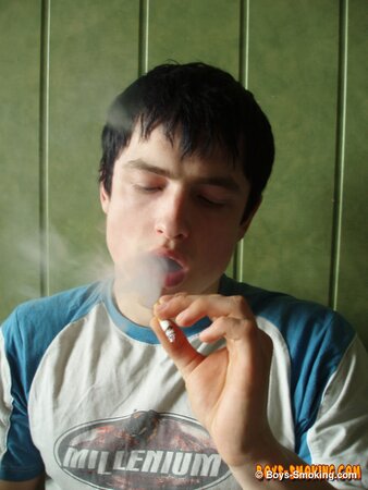 Gus Kitchen strokes his cock while smoking and cums fast