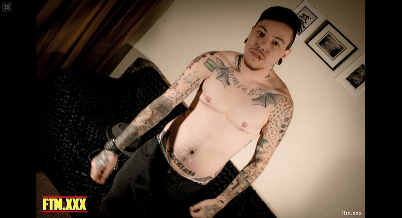 Travis Foxx erotically posing naked